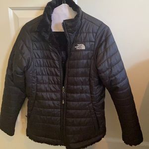 Girls North face reversible mossbud swirl jacket.